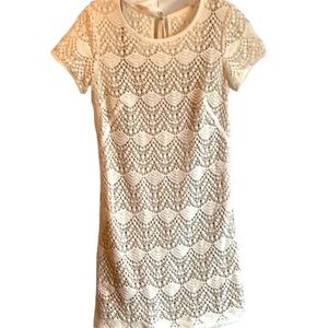 Cream crochet dress with nude slip.
